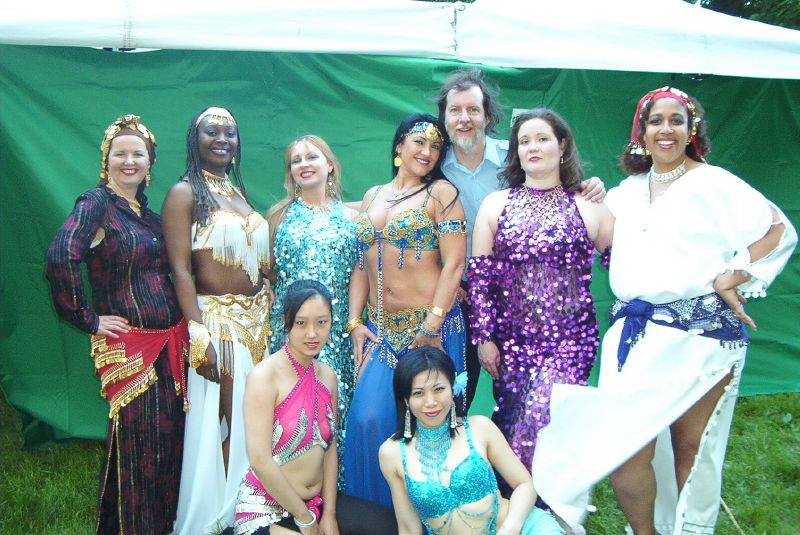 Benny of H to Oh! poses with the dancers